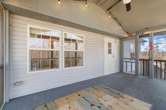 wooden terrace featuring ceiling fan