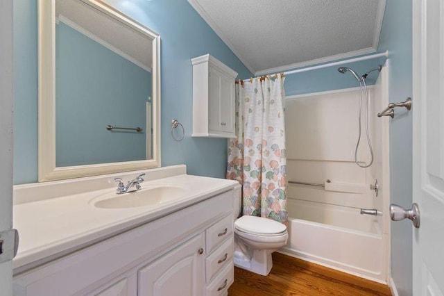 full bathroom with toilet, shower / tub combo, a textured ceiling, vanity, and hardwood / wood-style flooring