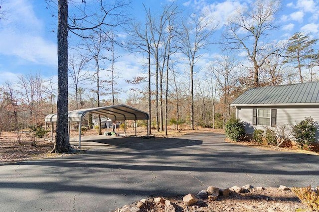 view of yard with a carport