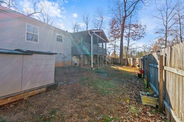 view of yard featuring a sunroom