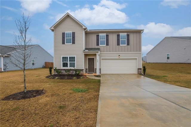 view of front facade featuring a garage and a front yard