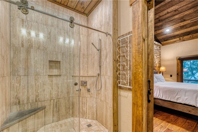 bathroom featuring wood ceiling, wood-type flooring, and an enclosed shower