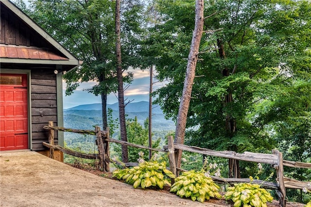 exterior space featuring a mountain view