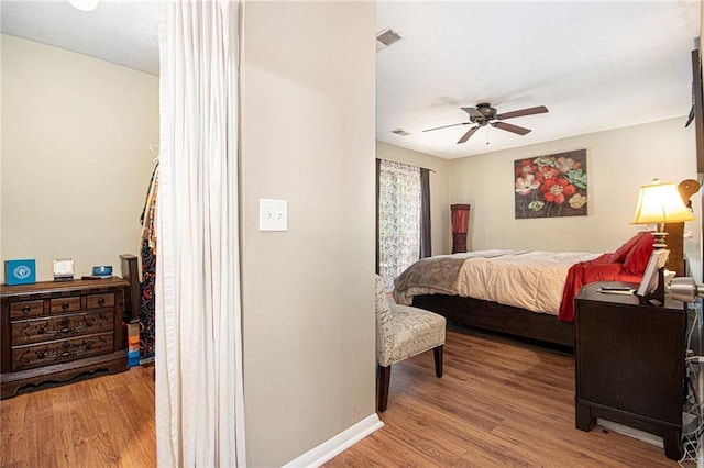 82 Twiggs Cor, Peachtree City, GA 30269 - bedroom featuring wood finished floors, baseboards, and a ceiling fan