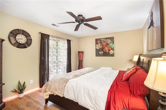 82 Twiggs Cor, Peachtree City, GA 30269 - bedroom with wood finished floors, baseboards, and ceiling fan