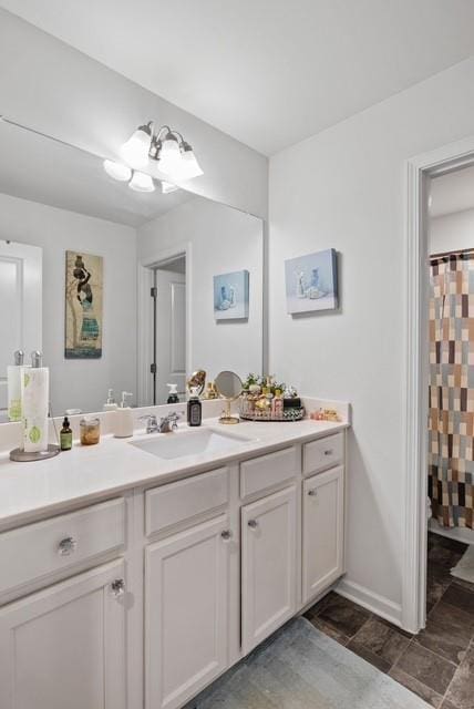 bathroom with vanity and walk in shower