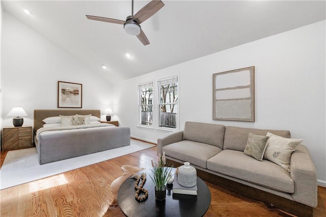 bedroom featuring wood finished floors, ceiling fan, recessed lighting, and vaulted ceiling
