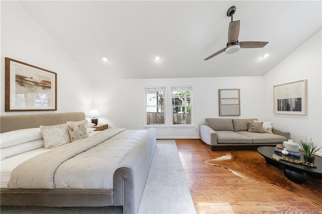 bedroom featuring recessed lighting, wood finished floors, ceiling fan, and vaulted ceiling