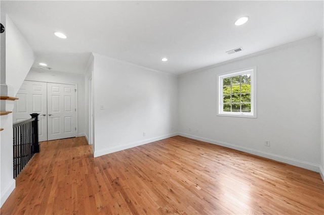 1349 Middlesex Ave NE, Atlanta, GA 30306 - unfurnished living room featuring ornamental molding, light wood-style flooring, baseboards, and recessed lighting
