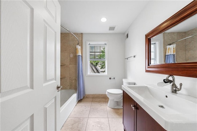 full bath featuring toilet, visible vents, tile patterned floors, and baseboards
