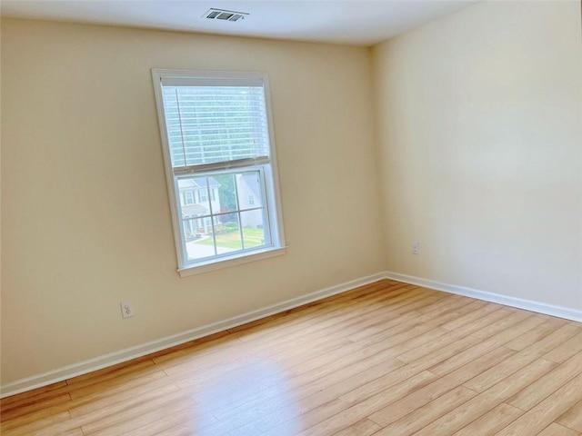 empty room featuring light hardwood / wood-style floors