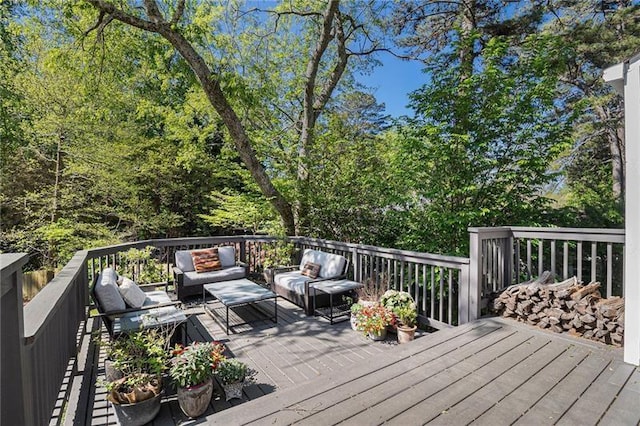 wooden deck featuring outdoor lounge area