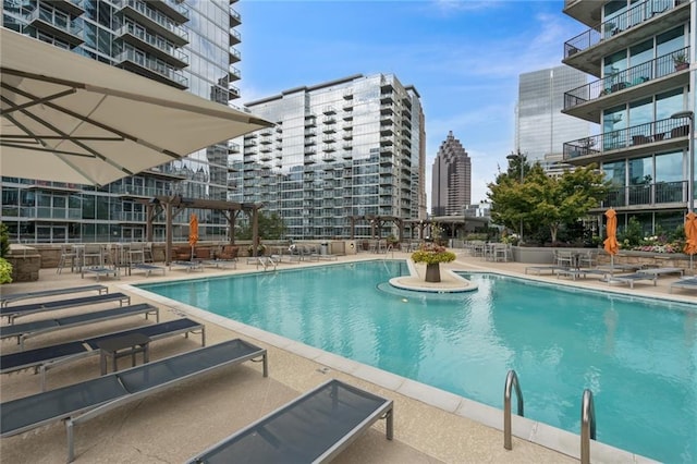 1080 Peachtree St NE Unit 1402, Atlanta, GA 30309 - community pool featuring a patio and a view of city