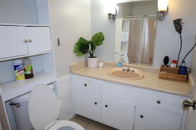 full bathroom with vanity, a shower with shower curtain, and toilet