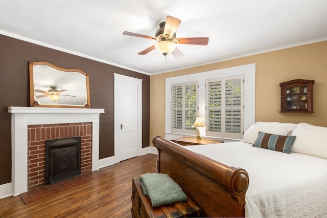 6596 Wright Rd NE, Atlanta, GA 30328 - bedroom featuring wood finished floors, baseboards, crown molding, ceiling fan, and a fireplace