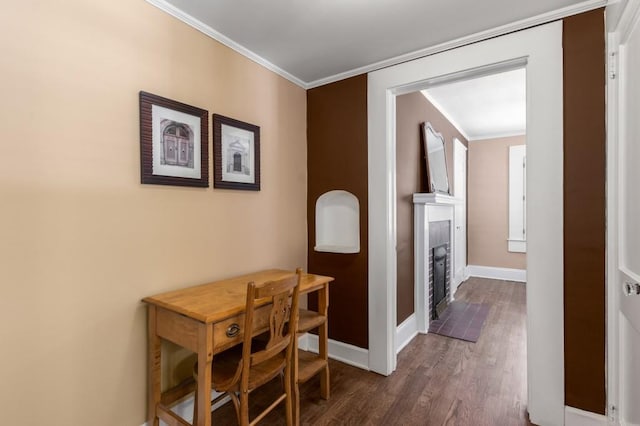 6596 Wright Rd NE, Atlanta, GA 30328 - hallway featuring crown molding, baseboards, and dark wood finished floors