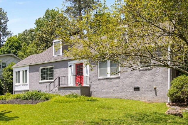 6596 Wright Rd NE, Atlanta, GA 30328 - view of front of home featuring a front lawn, crawl space, and brick siding