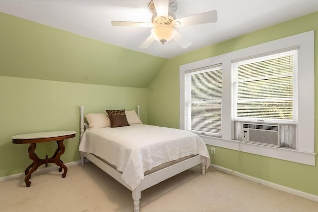 6596 Wright Rd NE, Atlanta, GA 30328 - carpeted bedroom with baseboards, a ceiling fan, cooling unit, and lofted ceiling