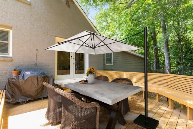 6596 Wright Rd NE, Atlanta, GA 30328 - wooden deck with outdoor dining area and french doors