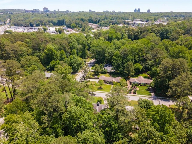 6596 Wright Rd NE, Atlanta, GA 30328 - aerial overview of property's location with a heavily wooded area