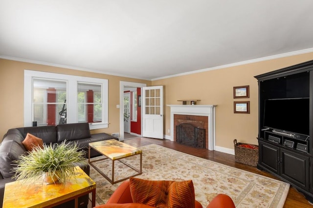 6596 Wright Rd NE, Atlanta, GA 30328 - living area with crown molding, wood finished floors, a brick fireplace, and baseboards