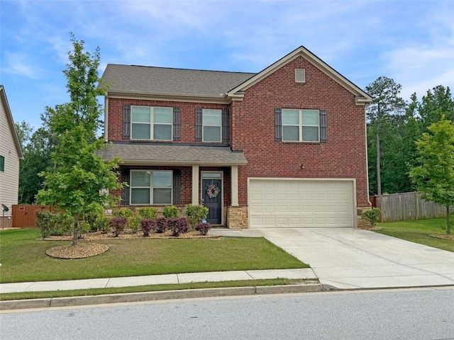 3062 Hawthorn Farm Blvd, Loganville, GA 30052 - view of front of house featuring an attached garage, driveway, and brick siding