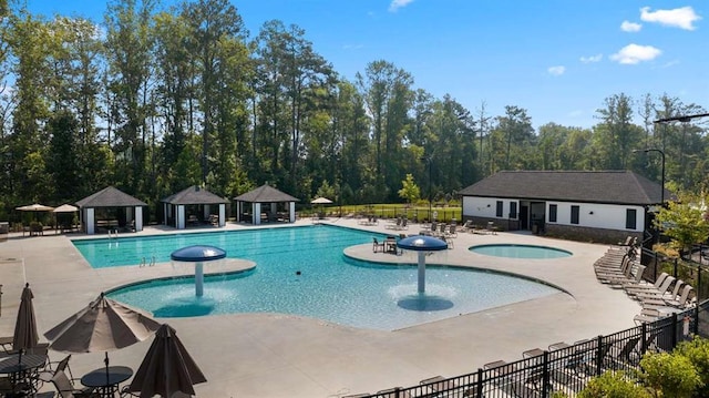 3062 Hawthorn Farm Blvd, Loganville, GA 30052 - community pool with a gazebo, a patio, an outdoor structure, and a jacuzzi