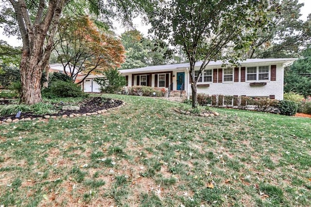 view of front of house featuring a front yard and a porch