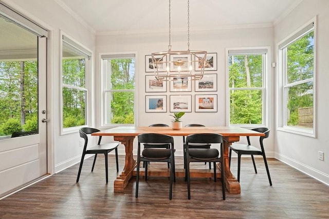 sunroom featuring plenty of natural light, french doors, and a chandelier