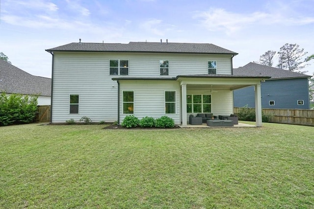 back of property with a patio, a ceiling fan, an outdoor hangout area, and a fenced backyard