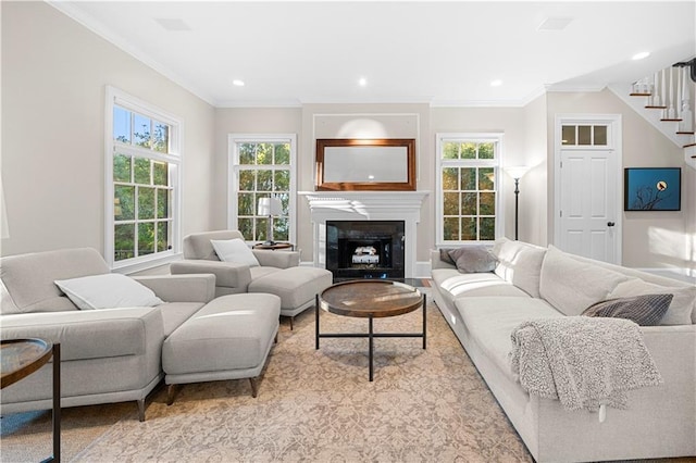 61 Alden Ave NW, Atlanta, GA 30309 - living room featuring stairway, plenty of natural light, ornamental molding, recessed lighting, and a fireplace