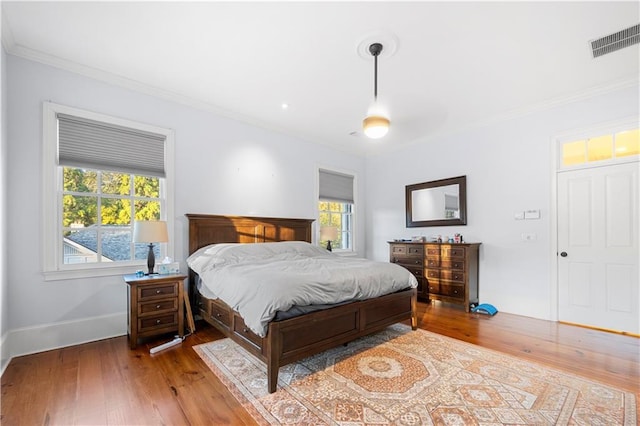 61 Alden Ave NW, Atlanta, GA 30309 - bedroom with hardwood / wood-style floors, crown molding, and baseboards