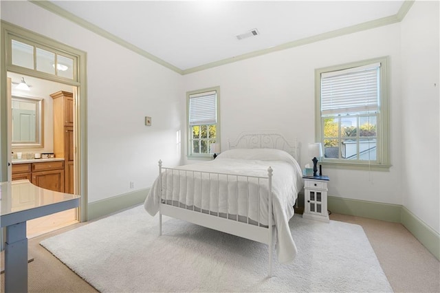 carpeted bedroom featuring multiple windows, visible vents, and crown molding