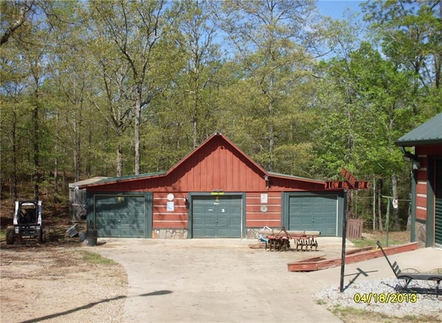 2969 Poplar Springs Rd, Buchanan, GA 30113 - detached garage featuring a wooded view