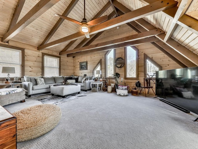 living room featuring beamed ceiling, carpet flooring, wood ceiling, and wooden walls