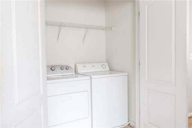 laundry room with washer and clothes dryer