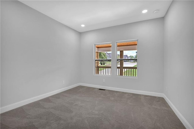 view of carpeted spare room