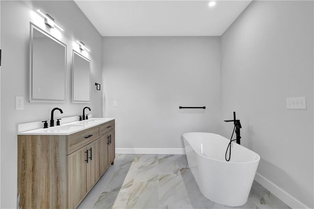 bathroom with a bathtub and vanity