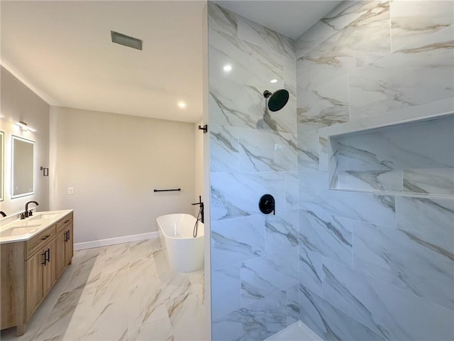 bathroom with vanity and shower with separate bathtub