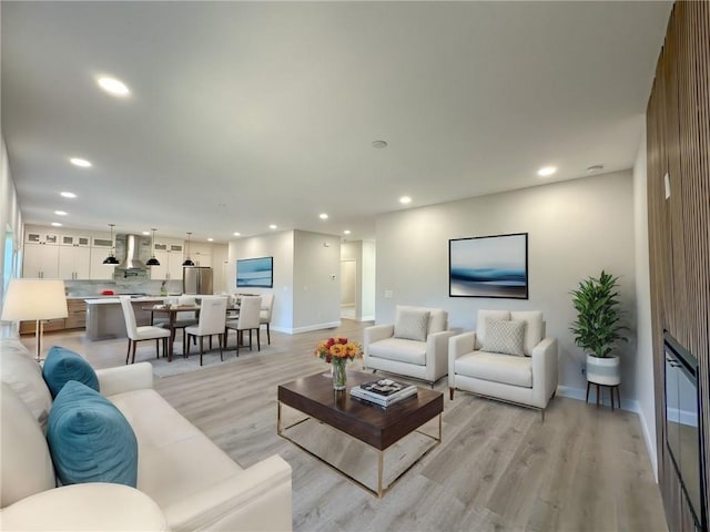 living room with light hardwood / wood-style floors