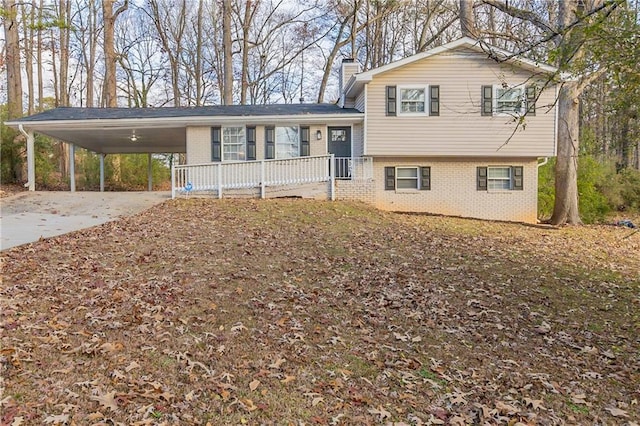 split level home featuring a carport