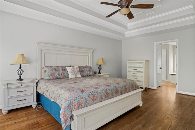 4381 Laurian Dr NW, Kennesaw, GA 30144 - bedroom featuring wood finished floors, crown molding, a raised ceiling, baseboards, and a ceiling fan