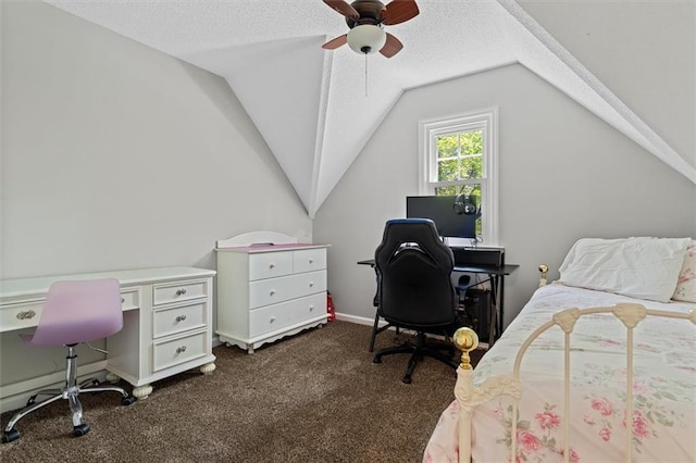 4381 Laurian Dr NW, Kennesaw, GA 30144 - bedroom featuring an office area, dark colored carpet, lofted ceiling, and a ceiling fan
