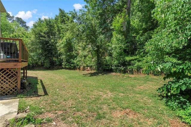 4381 Laurian Dr NW, Kennesaw, GA 30144 - view of grassy yard featuring a wooden deck