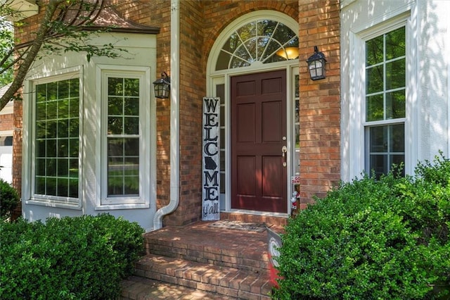 4381 Laurian Dr NW, Kennesaw, GA 30144 - view of exterior entry featuring brick siding