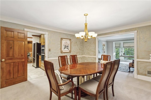 3298 Robinson Oaks Way NE, Marietta, GA 30062 - dining area with light carpet, a chandelier, crown molding, and baseboards