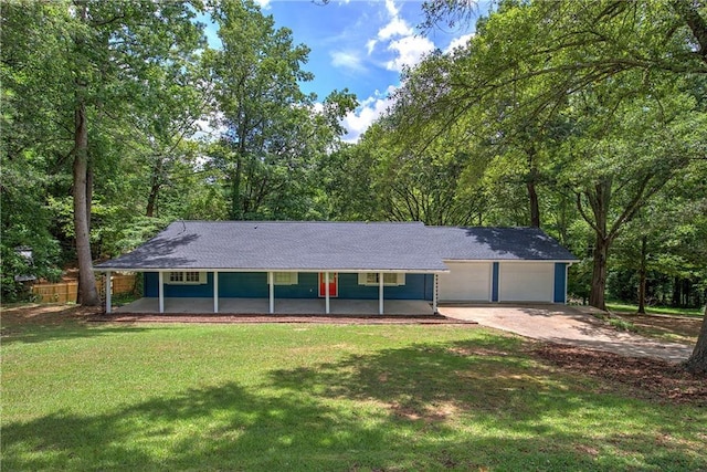 217 Water Tank Rd, Dallas, GA 30132 - view of front of home featuring a front lawn, covered porch, and a garage