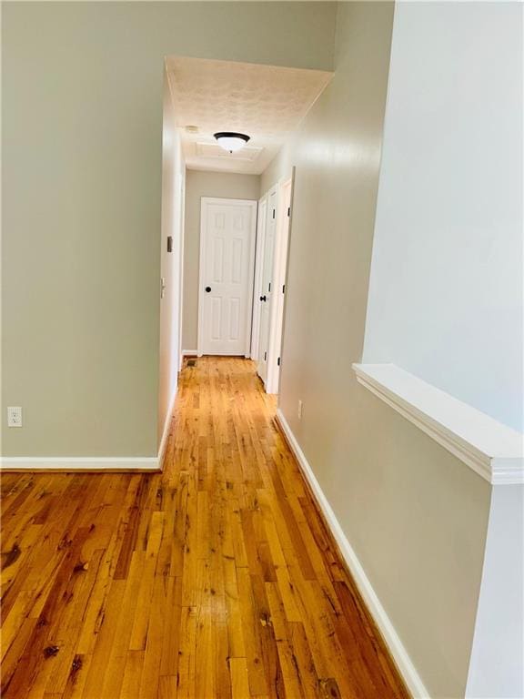 350 Fall View Ct, Winder, GA 30680 - corridor with light wood finished floors and baseboards
