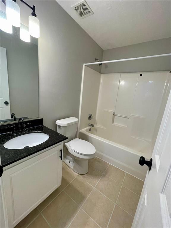 350 Fall View Ct, Winder, GA 30680 - full bath featuring tile patterned floors, vanity, shower / bath combination, and toilet
