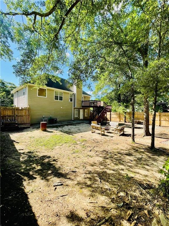 350 Fall View Ct, Winder, GA 30680 - rear view of property featuring stairway, a deck, and cooling unit